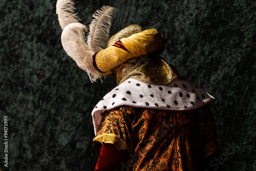 one of the Three wise men in traditional richly detailed costumes photo