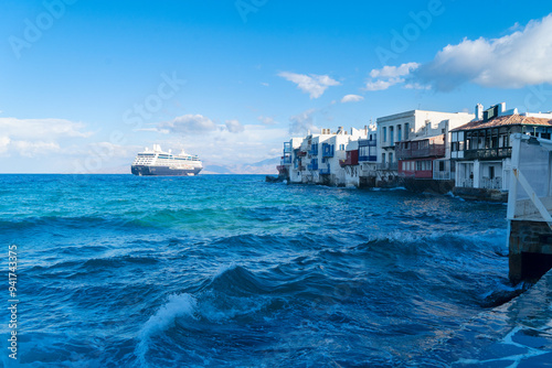 seaside cafe at Little venice district of Mykonos island, Greece with sunshine photo