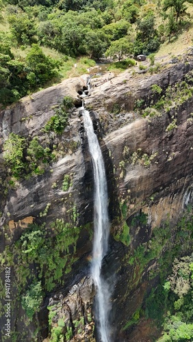 Waterfall in the jungle with natural pools on top. Drone view. Diyaluma Waterfall, Sri Lanka. photo