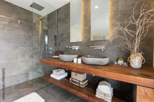 Modern bathroom with rustic wooden elements and dual sinks photo