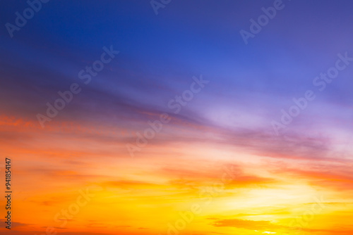 Colorful clouds and sky,Dusk, Sunset Sky Clouds in the Evening with colorful Orange, Yellow, Pink and red sunlight and Dramatic storm clouds on Twilight sky