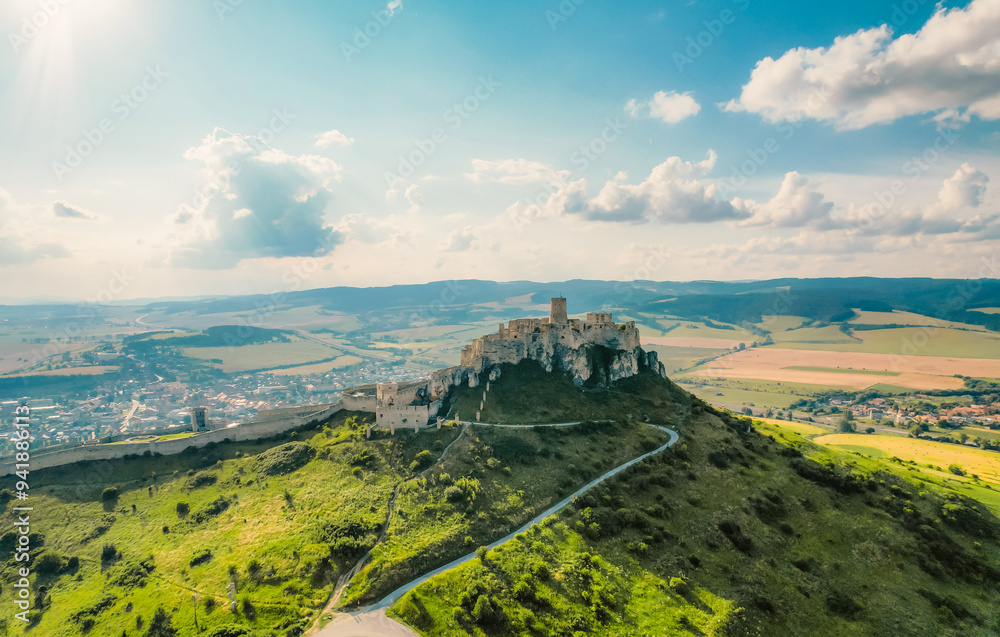 Fototapeta premium Aerial view of the Spiš Castle near Spisska Kapitula Slovakia, Tatra Mountains on the horizon