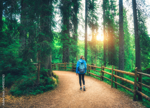 Woman in a blue jacket with...