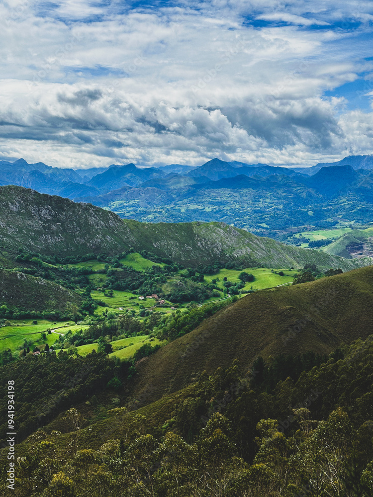 Obraz premium Tny village amidst the greenery and mountains of northern Spain, Asturias, Picos de Europa.