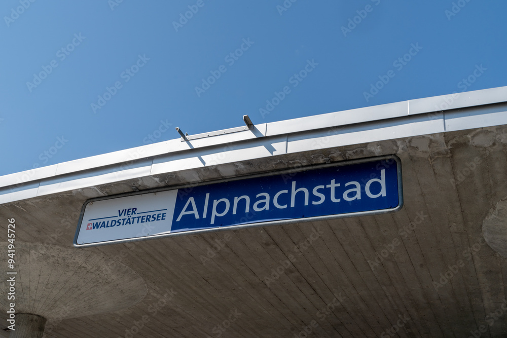 Obraz premium Sign for the ferry boat pier dock stop at Alpnachstad Switzerland. This stop is used by tourists taking the Golden Round Trip to Mt Pilatus