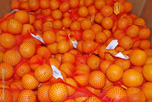 oranges at the market in bags