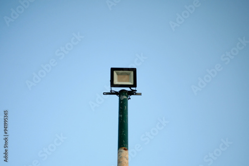 LED street lamp on blue sky background