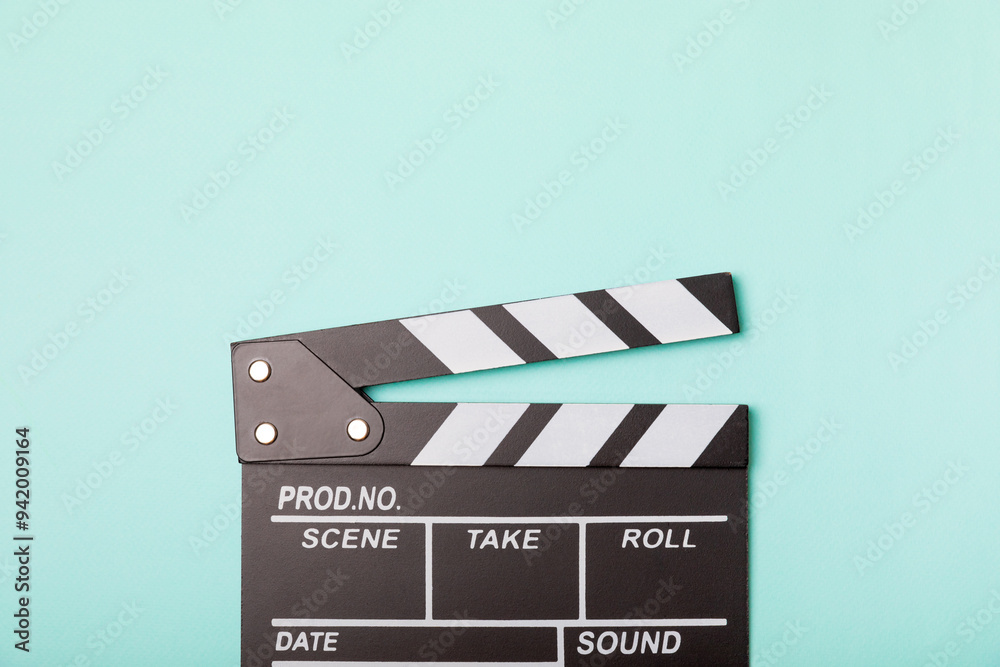 Fototapeta premium Movie clapper. Movie clapperboard on a bright colored background. Concept of rest and entertainment. Concept of cinema. Film director. Producer. Business and profession. Place for text. Copy space