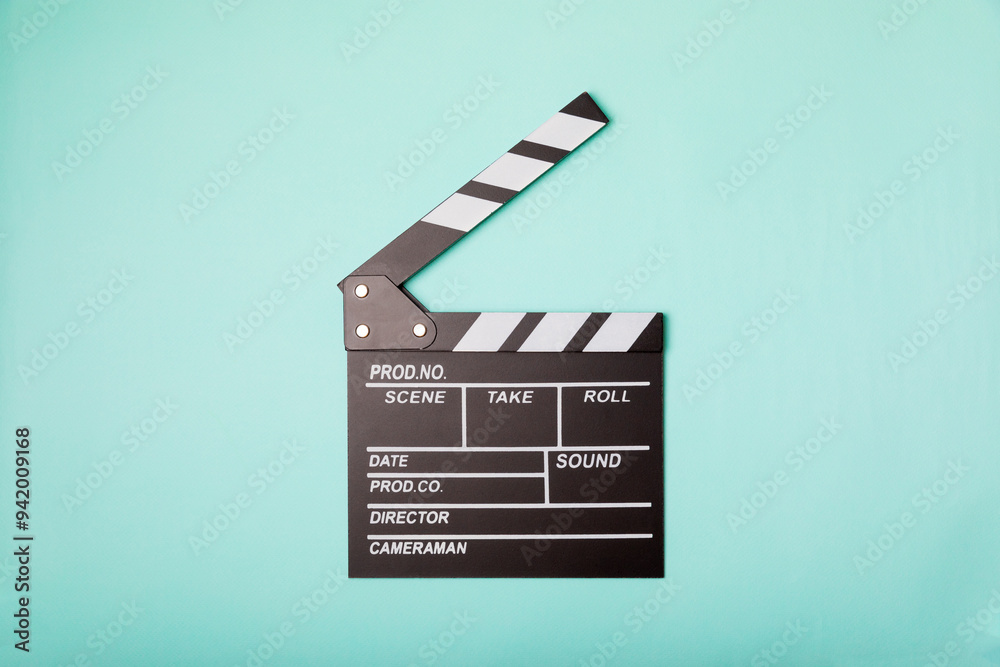 Naklejka premium Movie clapper. Movie clapperboard on a bright colored background. Concept of rest and entertainment. Concept of cinema. Film director. Producer. Business and profession. Place for text. Copy space