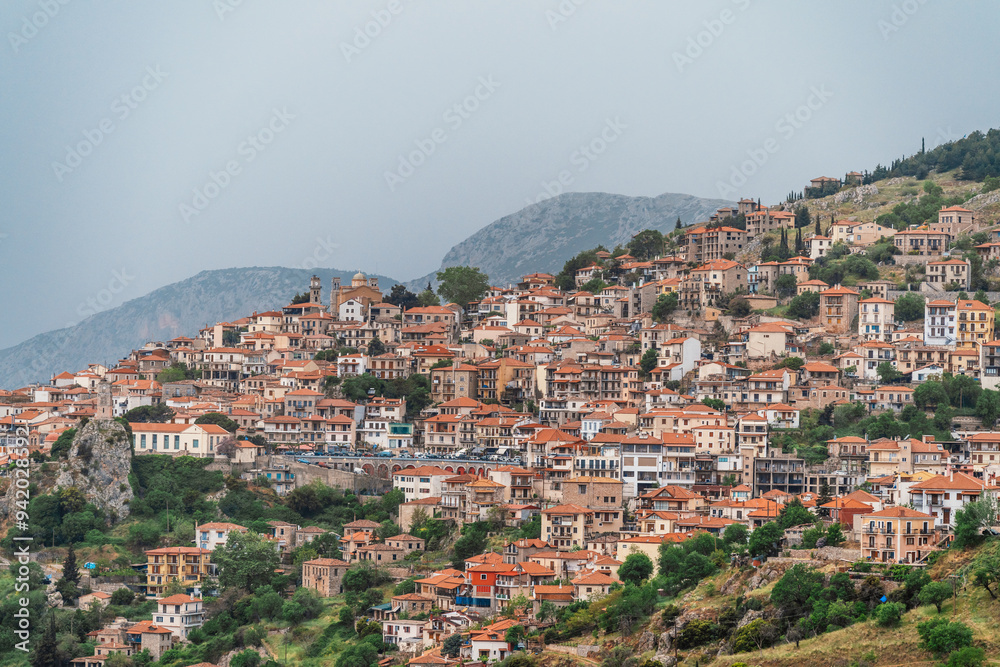 View of the town Arachova, Greece, near Parnassus mountain and Temple of Delphi. View of the town Arachova, Greece, near Parnassus mountain and Temple of Delphi.