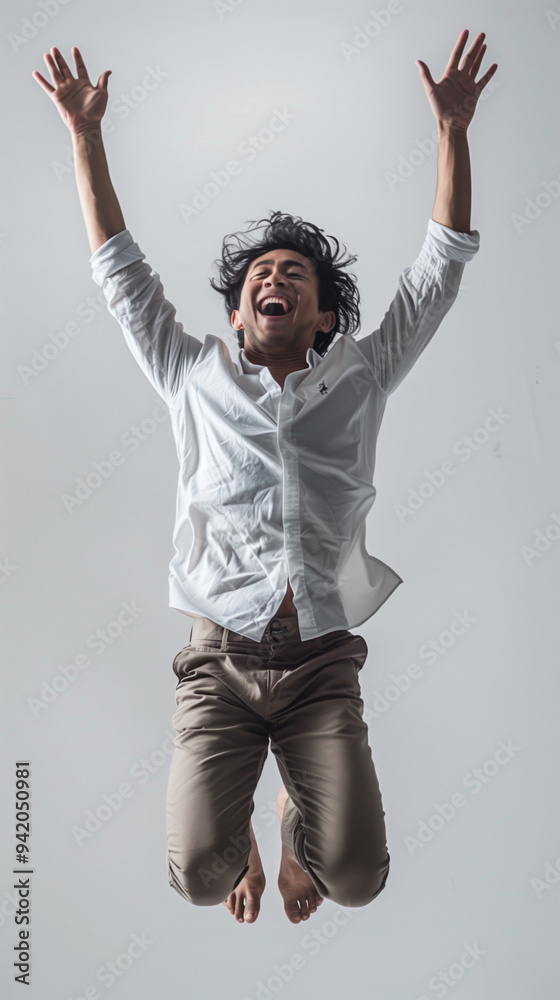asian man, happy jump, white background, advertising photography asian man, happy jump, white background, advertising photography