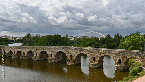 Merida Puente Romana - the longest surviving roman bridge. 755 metres with 62 spans over the Guadiano River. Now pedestrianised as road traffic is redirected over the nearby modern Lusitania Bridge. photo