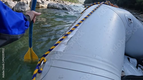 A whitewater rafting adventure on the famous Rishikesh River in India. This high-quality footage captures a group of thrill-seekers navigating the river's powerful rapids and intense rush.