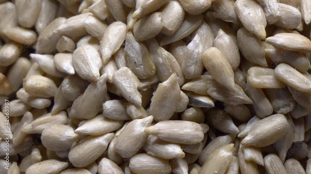 A close-up of sunflower seeds, emphasizing their natural color and earthy aroma. A close-up of sunflower seeds, emphasizing their natural color and earthy aroma.