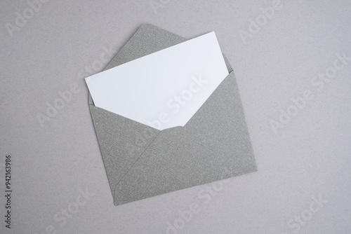 Paper envelopes on a light background. New mail, write a message. Send and receive mail. Postal delivery service. Empty envelope, empty space. Communication with people, paperwork. Envelope close-up photo