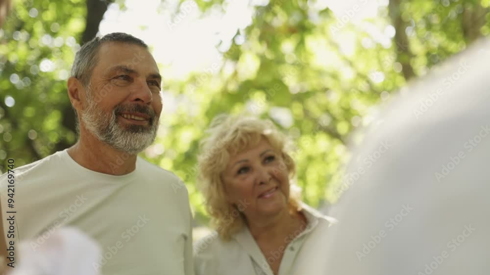 Family enjoying relaxing outdoors gathering Family enjoying relaxing outdoors gathering