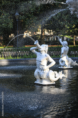Savannah, Georgia, USA. Neptune Nymphs spray water at the Fountain at Forsyth Park photo