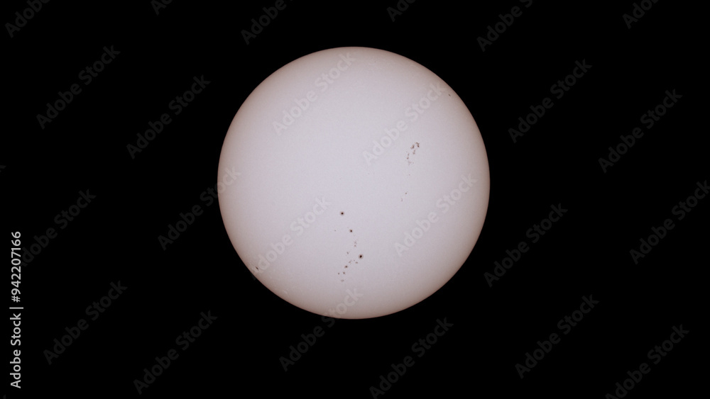 photograph of the sun made with a reflex camera, sunspots are observed