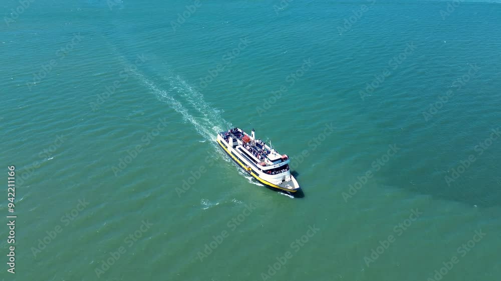 Drone aerial of ferry taxi ship boat heading into terminal Pier 41 wharf waterfront San Francisco Bay area sea maritime marine transport California USA America transport travel Drone aerial of ferry taxi ship boat heading into terminal Pier 41 wharf waterfront San Francisco Bay area sea maritime marine transport California USA America transport travel