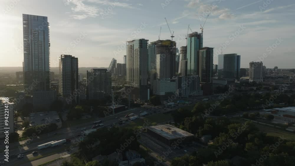 Wide shots of downtown Austin, Texas at sunset with IH35 traffic in foreground. Wide shots of downtown Austin, Texas at sunset with IH35 traffic in foreground.
