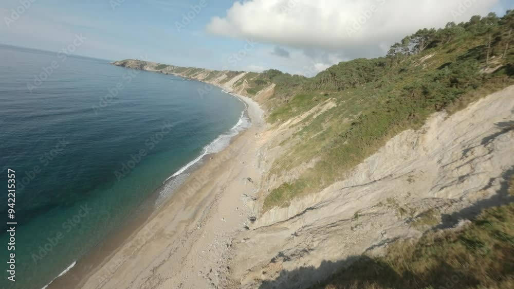 Closer aerial movement towards from the beautiful Vallina coastline at Asturias, Spain. Closer aerial movement towards from the beautiful Vallina coastline at Asturias, Spain.