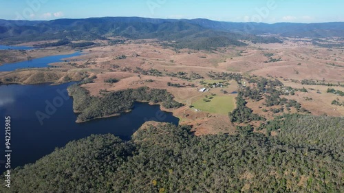 Lake Wivenhoe With Surrounding Fields And Vegetation In Queensland, Australia - Aerial Shot photo