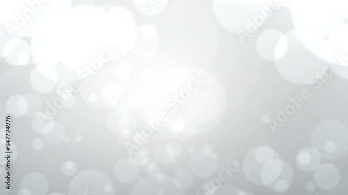 Gray background with white circles and light, perfect for modern and sleek design projects needing a minimalist touch. Ideal for presentations and digital artwork.