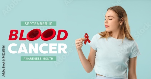 Woman with red ribbon on light blue background. Banner for Blood Cancer Awareness Month photo