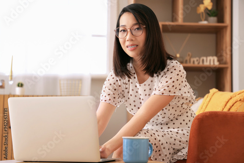 Beautiful Asian woman in st...