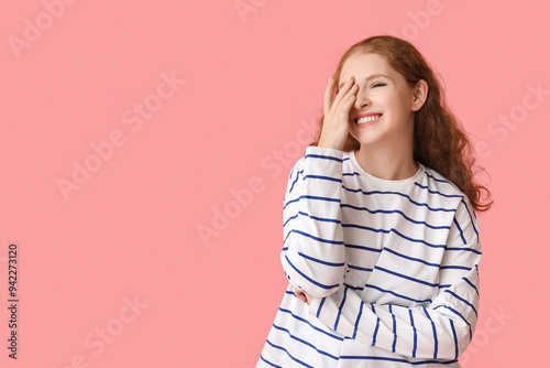 Portrait of shy young woman...