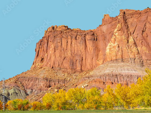 USA, Utah. Capitol Reef National Park, Fruita Orchards and Fruita Cliffs photo