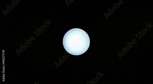 small glowing white quantum sphere with super smooth breathing effect on a pure black background