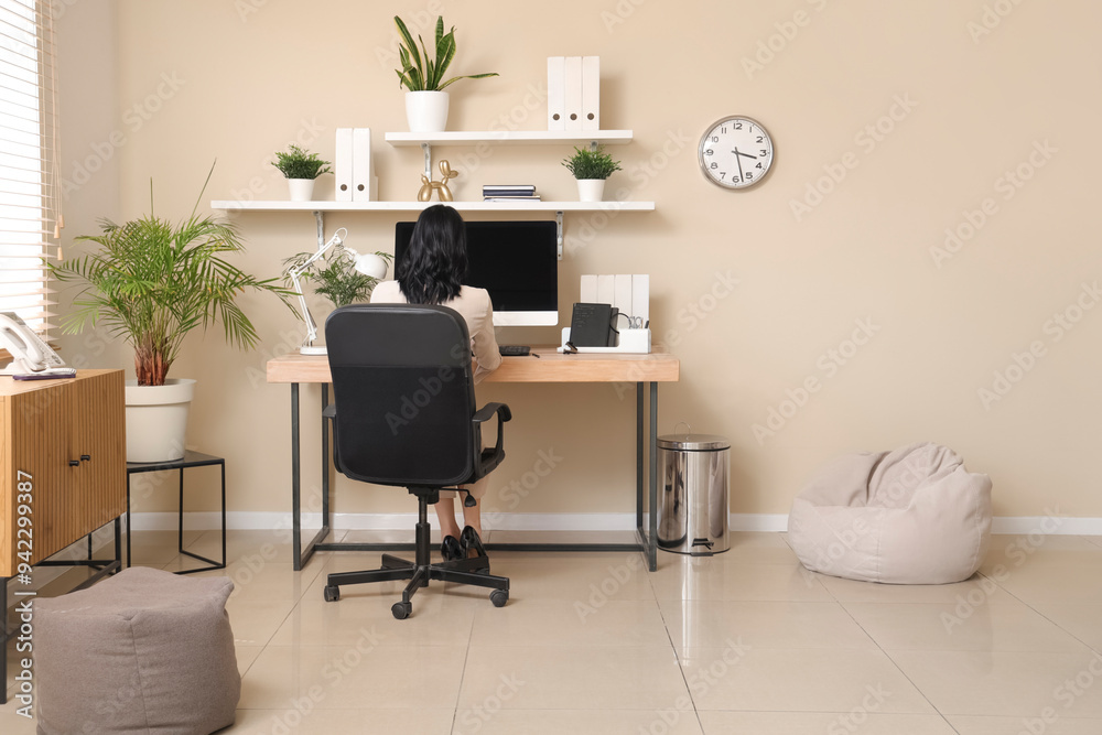 © Pixel-Shot - Stylish interior of office with workplace, modern computer, shelves and armchair © Pixel-Shot - Stylish interior of office with workplace, modern computer, shelves and armchair