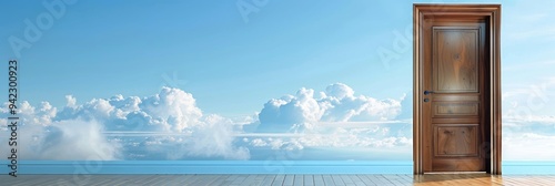 Large solid door on the right side opening to the right  featuring an ornate doorknob against a serene backdrop of a vast open sky.