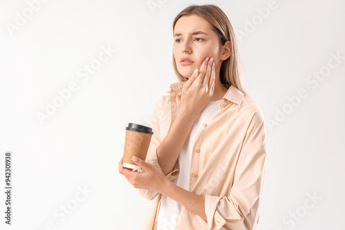 Young woman with cup of hot...