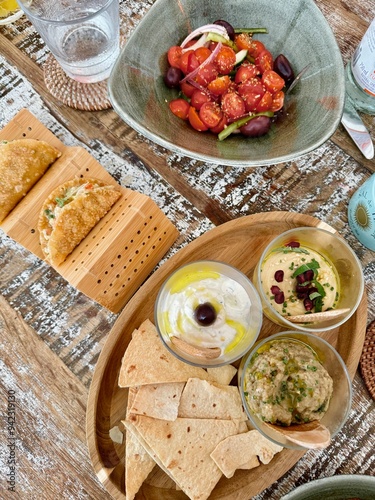 Aesthetic greek dips with mini tacos appetizers