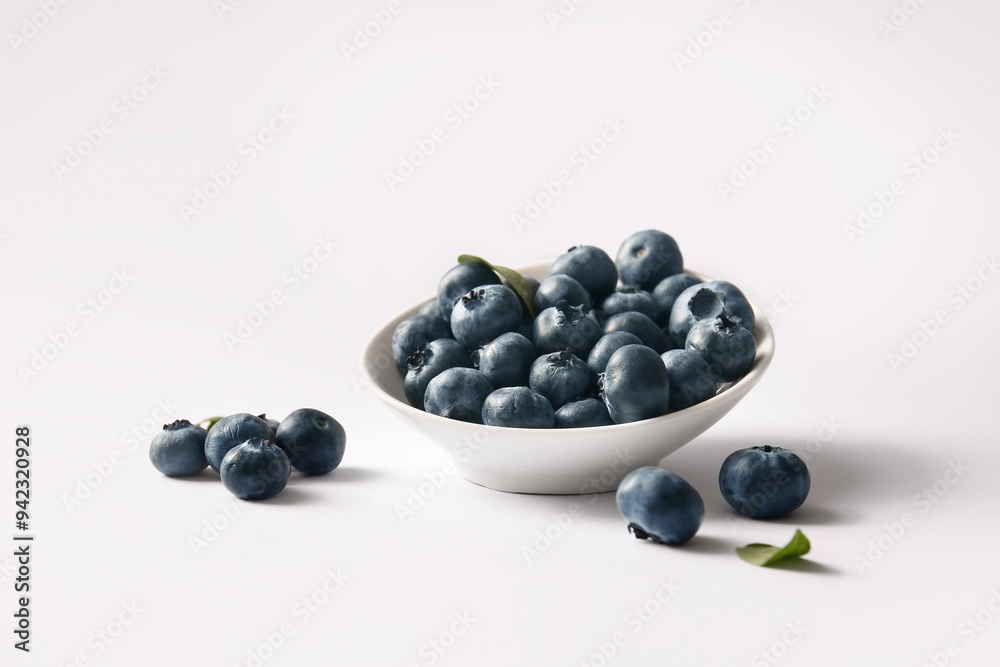 Bowl with fresh ripe blueberry on white background, closeup Bowl with fresh ripe blueberry on white background, closeup