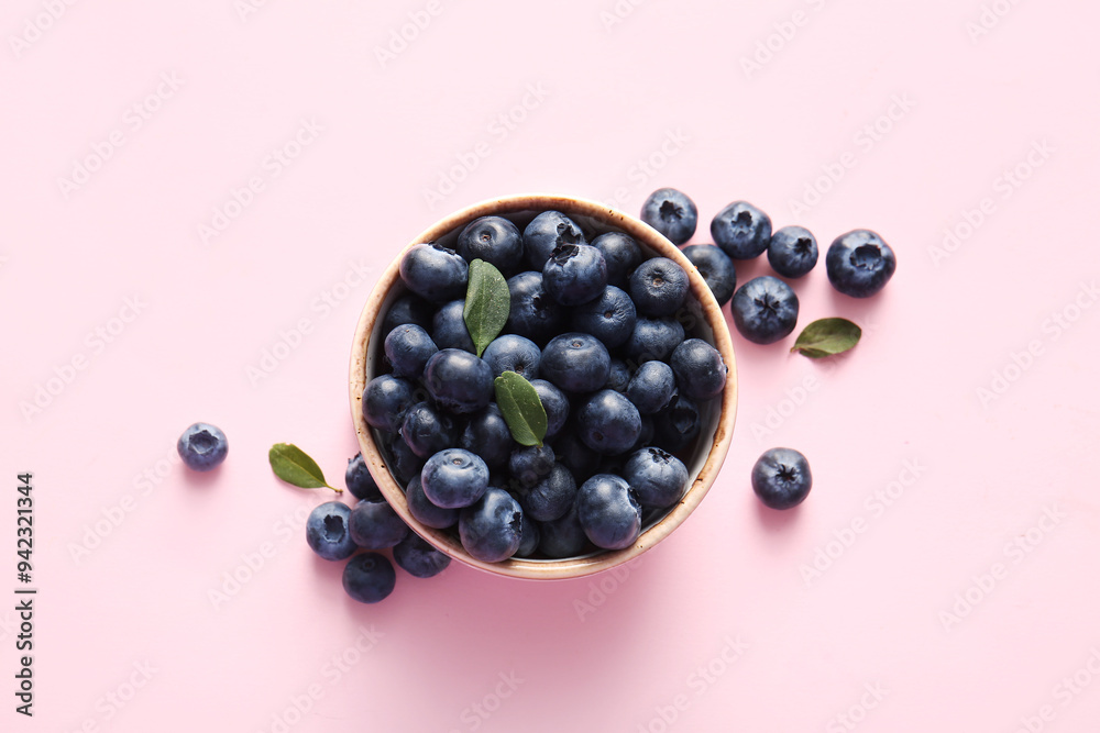 Bowl of fresh ripe blueberry on pink background, closeup Bowl of fresh ripe blueberry on pink background, closeup