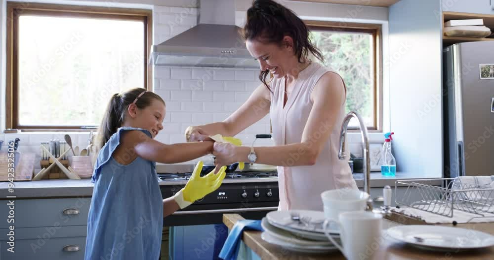 Woman, child or kitchen for gloves for cleaning dishes, hygiene or happy with communication in house. Mother, daughter and learn housekeeping by dirty plates and cups, disinfectant and relax in home