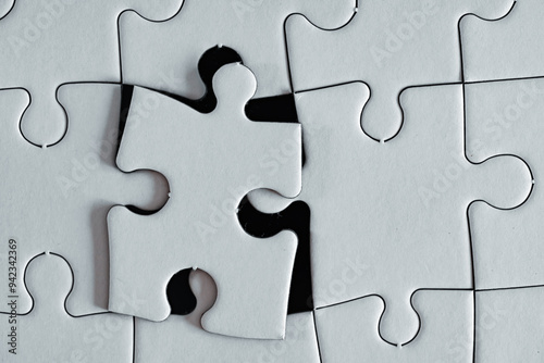 The last piece of a puzzle that is near its final position