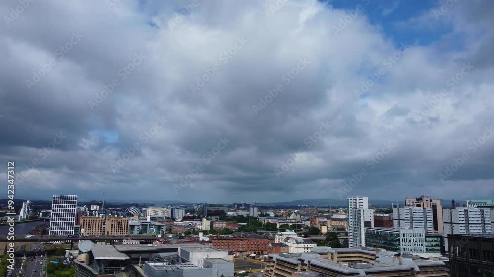 Aerial View of Central Glasgow city of Scotland, United Kingdom. June 5th, 2024, Footage Captured with Drone's Camera During Windy Day from River Side. Aerial View of Central Glasgow city of Scotland, United Kingdom. June 5th, 2024, Footage Captured with Drone's Camera During Windy Day from River Side.