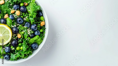 close-up of vibrant organic salad with fresh blueberries and greens, with copy space for text