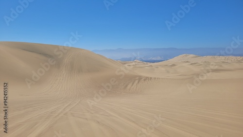 Sand dunes desert city Peru