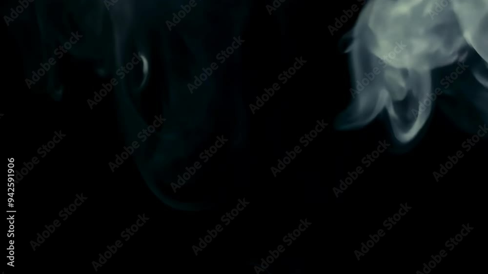 Dark Smoke Rising on a Black Background for Cinematic Transitions Dark Smoke Rising on a Black Background for Cinematic Transitions
