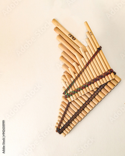Panpipes on beige background isolated. Rondador. Andean Instruments. South American instruments. Wind instruments. Pan flute.