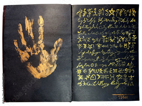 Hand drawn illustration of decorated old pages with palm and mystic symbols on black from witch magic spell book. Gothic, occult and esoteric background. Only fantasy letters, no foreign language