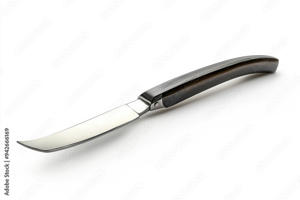 A straight razor with a sharp blade and a classic handle, isolated on a white background. A straight razor with a sharp blade and a classic handle, isolated on a white background.