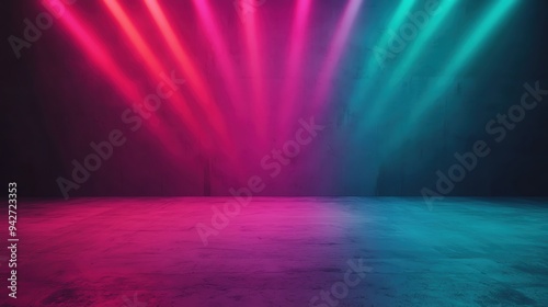 Empty stage with bright pink and teal spotlights creating a vibrant and colorful atmosphere. Perfect background for events or performances.