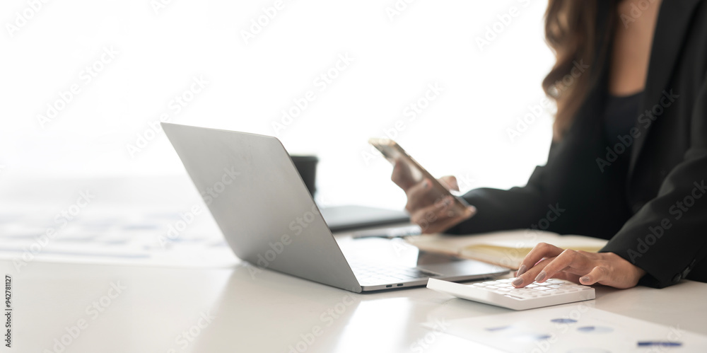 Businesswoman working Financial investment on calculator, calculate, analyze business and marketing growth on financial document data graph, Businesswoman working Financial investment on calculator, calculate, analyze business and marketing growth on financial document data graph,