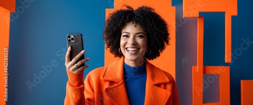 Happy gen z woman holding a phone